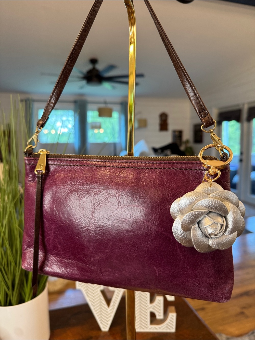 HOBO Burgundy Leather Wristlet with Silver Flower Charm